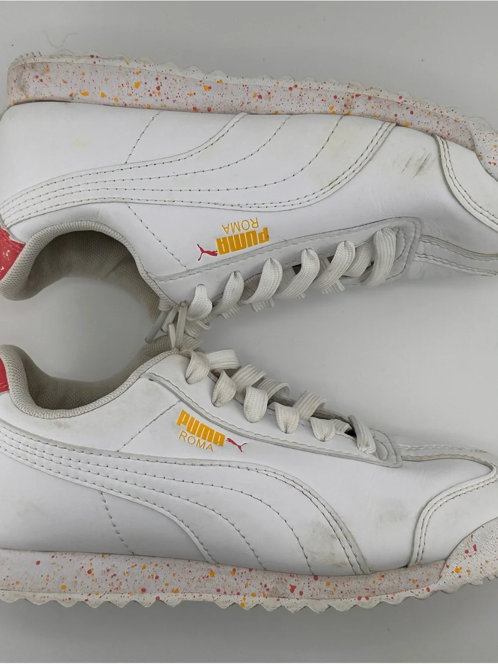 Puma Kids White Low-Top Sneakers with Gold Logo and Speckled Sole